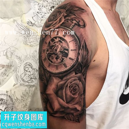 大臂外侧钟表玫瑰花纹身图片
