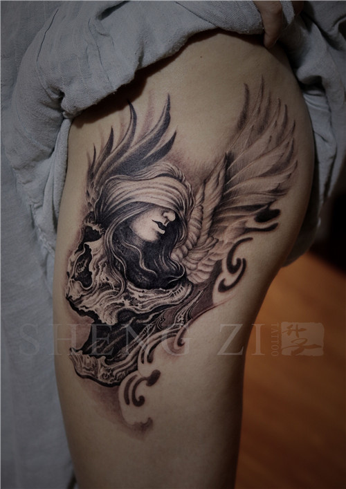 重庆知名纹身店_大腿外侧天使骷髅纹身图案